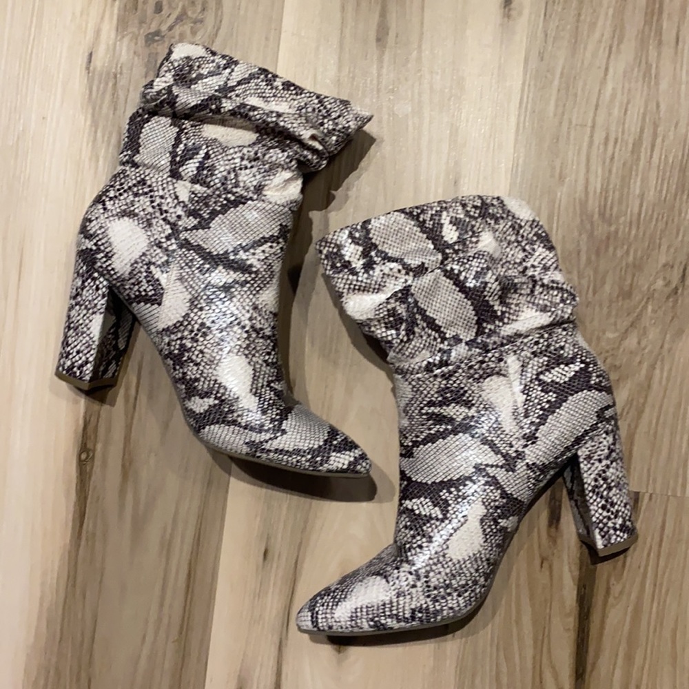Snakeskin heeled slouch booties